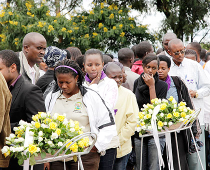 Relatives of Genocide victims queue to pay their respects at a past commemoration event. The New Times/File