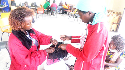 Some of the former commercial sex workers undergo  hair-dressing lessons at the centre in Musanze District.   The New Times/ Ivan Ngoboka.