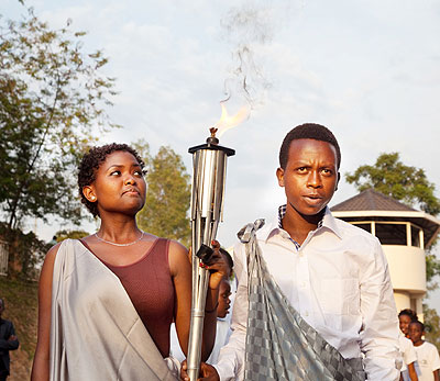 Children carry the Kwibuka Flame. The flame is making a tour of the country ahead of the 20th anniversary of the Genocide against the Tutsi. The New Times/File.