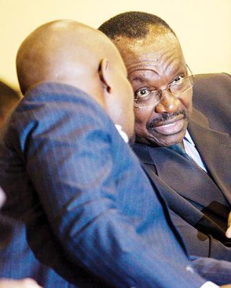 ICT and Youth minister Jean-Philbert Nsengimana ( L) chats with his  Trade and Industry counterpart Franu00e7ois Kanimba during the meeting in Kigali on Sunday. The New Times/ Timothy Kisambira.