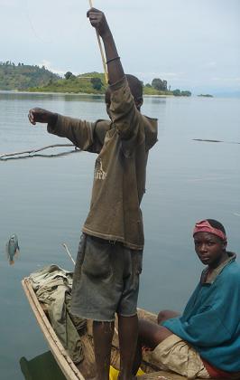 A child fishes in Lake Kivu. Poor fishing methods have led to the depletion of fish in the Lake . File. Mbanda.