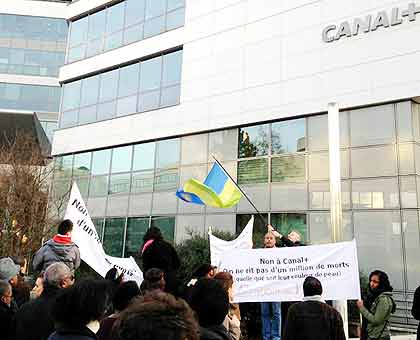 The Rwandan community in France and their friends and well-wishers protest outside Canal+ Group headquarters in Paris last week.  The New Times/ File.