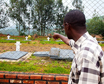 Innocent Kamanzi suspects his family was buried in this Ngororero District site. The New Times/ T. Kisambira.