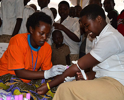A young girl during an HIV/Aids test in Musanze District. Imbuto Foundation has urged local leaders to help the youth on sexual health and HIV/Aids prevention. The New Times/Jean d....