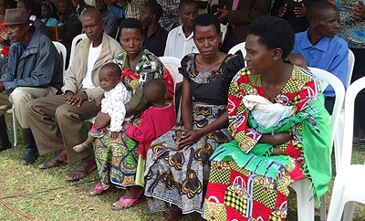 Some of the evictees at the ceremony in Ruhashya sector. They have been reassured of continued government support.   Jean Pierre Bucyensenge.