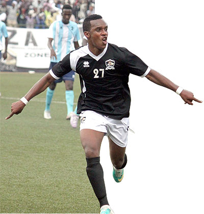 Patrick Sibomana celebrates after scoring for APR against police yesterday at Stade de Kigali.  Photo: P. Muzogeye.