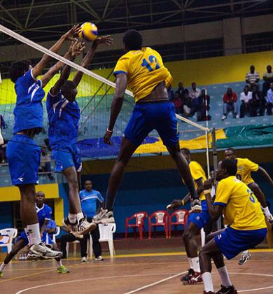 National teamu2019s Flavien Ndamukunda #12, goes up for a spike against Rayon Sports during Fridayu2019s build-up match, which Bitoku2019s team won 3-0. Timothy Kisambira.