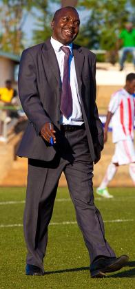 Sam Ssimbwa, seen here with a smile at the end a previous league match with Etincelles, believes Police FC didnu2019t deserve to lose against APR on Sunday. Timothy Kisambira.