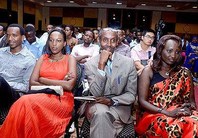 A cross section of actors who starred in the movie seated at the front row.