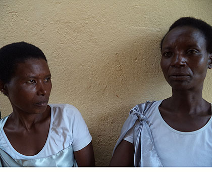 Emma Marie Mukambaraga, 53 (L), and Marianna Uzamukunda say they are making efforts to transform their lives but need more capital to succeed.    Jean Pierre Bucyensenge.