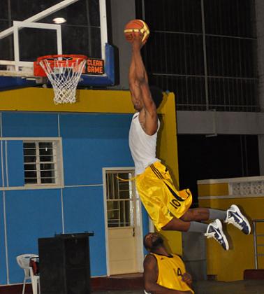 New Espoir signing Mike Buzangu goes for a slam dunk during a practice session. He is one of the most entertaining players in the local league. Plaisir Muzogeye.
