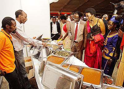 City of Kigali Mayor Fidu00e8le Ndayisaba and other guests at the Egyptian stall. All photos by Timothy Kisambira.