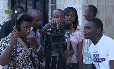 Jerome Mugabo prepares for shooting work with other youths. Courtesy.