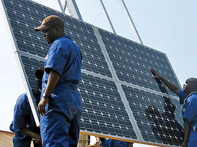 Technicians installing solar panels. Rwanda to  get 8.5MW of power from a new solar plant being set up by private investors. Net photo.