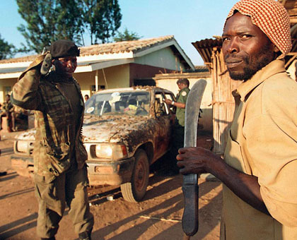 Members of the Interahamwe militia during the 1994 Genocide against the Tutsi. The Habyarimana regime enlisted the services of many civilians in preparation for the Genocide.  Net photo. 