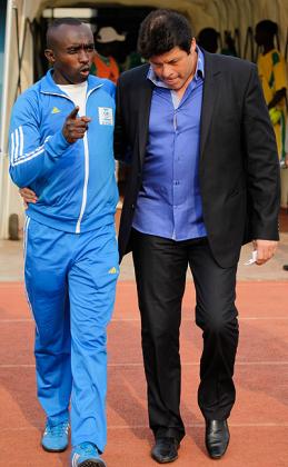 Luc Eymael (right) listens to one his assistants Thierry Hitimana, left, as they emerged from the tunnel in the game against  AC Leopards in the Caf Champions League two weeks ago.....