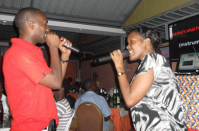 u2018Karaokiansu2019 doing a duet. File photos
