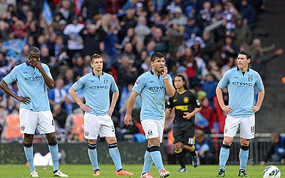 City players look despondent after their shock defeat in the FA Cup final. Net Photo