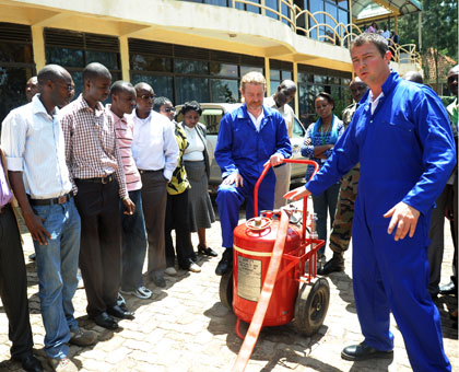 Experts train members of security agencies on handling of fire-fighter equipment in Kigali in 2012. File.