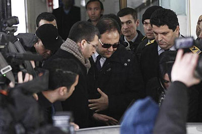Baris Guler (in sunglasses) was among those released after the necessary evidence had been collected. Net photo.