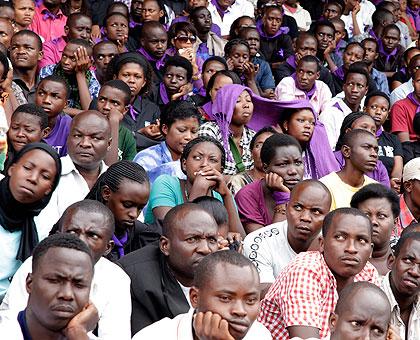 People listening to testimonies during a commemoration ceremony at Amahoro Stadium in 2012. File