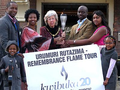 The Mayor of the Borough of Broxtowe, Iris White (C) receives the flame. Courtesy