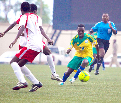Sophie Niyomugaba seen dribbling past Kenyan defenders in the first leg scored the lone goal for Rwanda in the 2-1 loss to Kenya yesterday. Rwanda marched into the second round on ....
