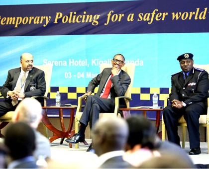 President Kagame (C), IGP Gasana (R) and the president of International Association of Chiefs of Police, Yost Zakary, at the sub-Saharan Africa Executive Policing Conference in Kig....