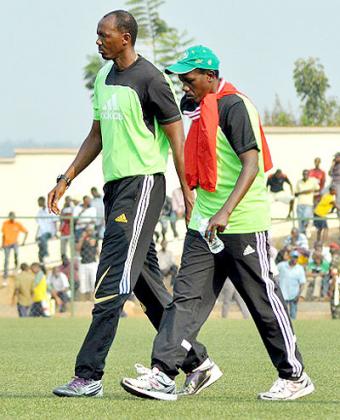 WALKING A TIGHT ROPE; The contract of Eric Nshimiyimana, (left), and his assistant Jean Baptiste Kayiranga will expire this month. File