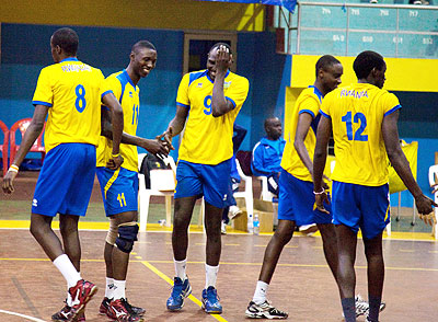 Rwandan internationals, Yakan Lawrence Guma, middle, and Christophe Mukura, #12, will be affected by the Algerian V-ball federation decision. (File)