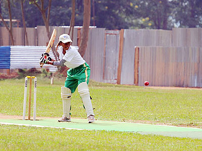 White Cloudsu2019 Mary Maina in action with the bat as she led her team to a 41 run win over rivals Charity CC at the weekend. (Courtesy)