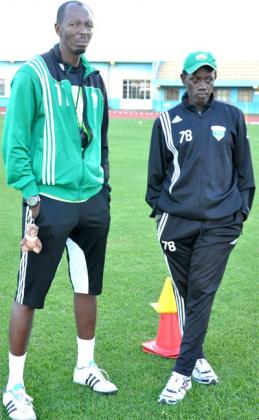Amavubi head coach Eric Nshimiyimana, left and his assistant Jean Baptiste Kayiranga, right have come under criticism by the fans for the team's struggles. File