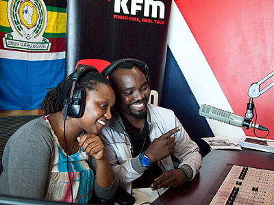 Ginty (L) and MC Tino on air in the KFM studios. (Courtesy)