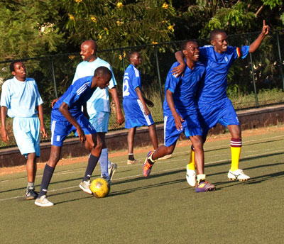 The entire TNT Football team pose for a group photo before the match against Kinazi Cassava plant on Saturday at Kicukiro ground.