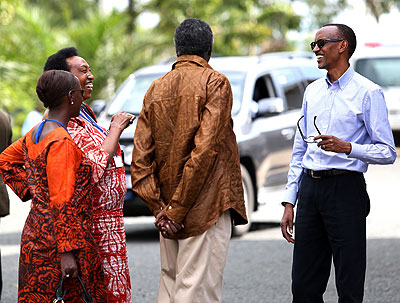 President Paul Kagame shares a light moment with some of the officials at the 11th National Leadership Retreat.   