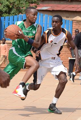 Lionnel Hakizimana, (left) in action against APR last weekend. He scored 21 points against UGB on Saturday as Espoir maintained their winning streak. Plaisir Muzogeye.