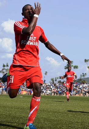 Striker Kassim Habyarimana wheels off in celebration after opening the scoring for Espoir against Rayon Sports on Sunday at Stade de Kigali. Sam Ngendahimana
