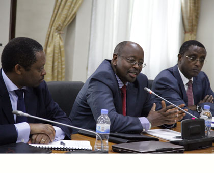 Local Government minister James Musoni (C), Education minister Dr Vincent Biruta (R) and the CEO, Rwanda Governance Board, Prof. Anastase Shyaka at the press briefing yesterday. John Mbanda