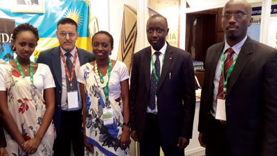 Joseph Kabakeza, First Consular at the Rwandan High Commission in India (second, right) with Clarence Fernandes, RDB India representative (second from the left) at the Rwandan boot....