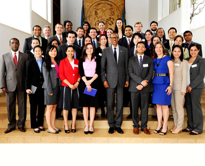 President Paul Kagame in a group photo with American MBA students at Village Urugwiro yesterday. Village Urugwiro.