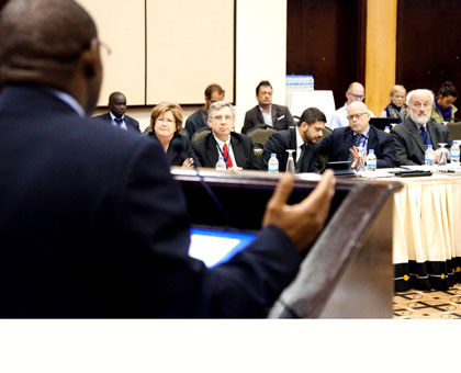 Amb. Gatete addresses the stakeholders at the symposium in Kigali yesterday. Timothy Kisambira. 