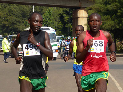 Alexis Nizeyimana (L) and Fu00e9licien Muhitira compete in last yearu2019s MTN Kigali Half Marathon. They will lead Rwandau2019s search for a silverware in Copenhagen on Sunday. (Timothy Kisambira)