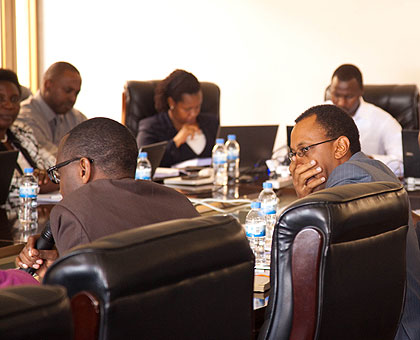 EWSAu2019s board chairperson, Papius Musafiri (left), and Director General of EWSA, Ntare Karitanyi (2nd left) appear before MPs on Tuesday. (File)