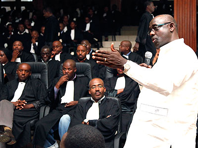 Justice minister Busingye gives a presentation during a meeting of lawyers at the Supreme Court on September 15, 2011. (File)