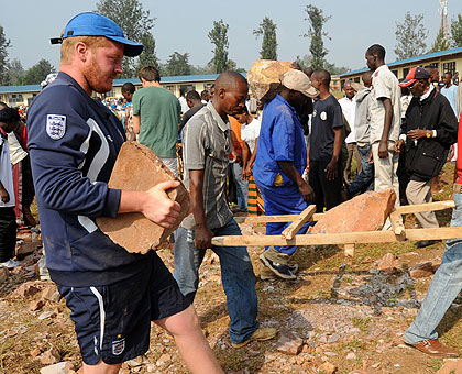 A foreigner joins locals in Umuganda in Kicukiro District in 2012. (John Mbanda)