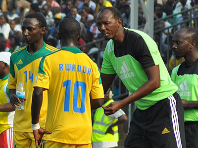 Nshimiyimana (R) gives instructions to a player in a previous game. (File)