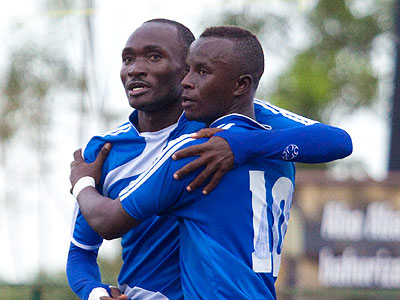 The two goal scorers, Cederic Amissi (L) and Robert Ndatimana, celebrate together on Sunday. (Timothy Kisambira)