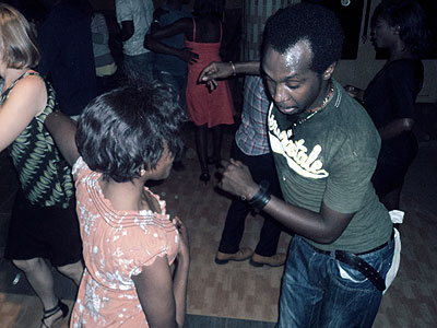 Rudahunga (R) in one of his Salsa classes. (Courtesy)