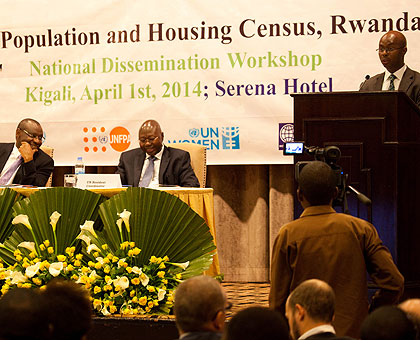 Murangwa (R) gives his remarks while releasing the report as Finance minister Claver Gatete (L) chats with Manneh in Kigali yesterday. (Timothy Kisambira)