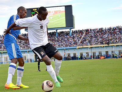 Jean-Claude Iranzi, right, tries to shield the ball from Rayon Sports midfielder Djamal Mwiseneza during a league match. The two bust to to local scene in 2004. (File)